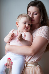 Happy mother with her baby