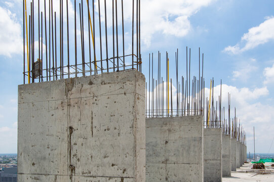 Steel reinforce in concrete column.Steel grid on the construction site.Reinforcement of concrete work. Using steel wire for securing steel bars with wire rod for reinforcement of concrete