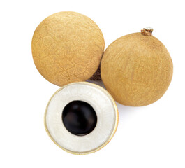 Longan with leaf isolated on white background. Tropical Longan fruit Close-up. Top view.