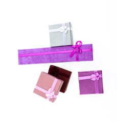 set of pink and lilac giftbox yf, tkjv in isolated background festive decor