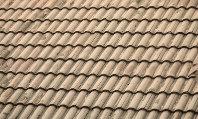 background old brown roof wavy vertical part of the building