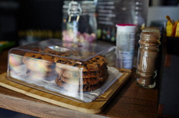 Tasty cookie at bar counter in coffee shop