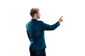 A man, a businessman in a business suit is isolated on a white background, points at something with his finger.