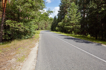 Obraz premium Asphalt twisty suburban road