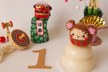 サルのあみぐるみとお正月イメージ