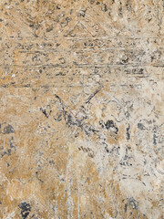 Ancient craving wall texture in Thai northern buddhist temple