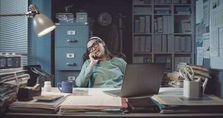Lazy office worker talking on the phone