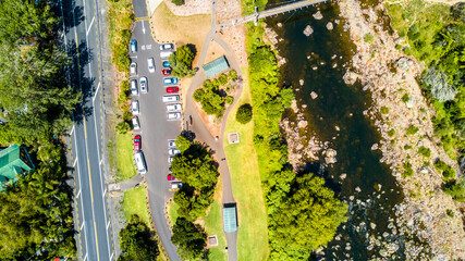 Cable bridge across mountain river. Coromandel, New Zealand.