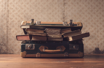 Vintage suitcase full of old books