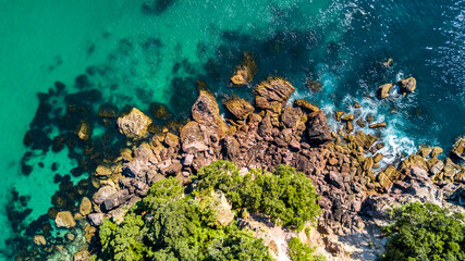 Fototapeta na wymiar Aerial view on a rocky ocean coast. Coromandel, New Zealand.