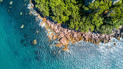 Aerial view on a rocky ocean coast. Coromandel, New Zealand.
