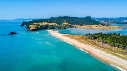 Aerial view of a sunny beach. Coromandel, New Zealand.