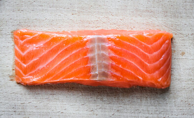 Salmon steak on a cutting board
