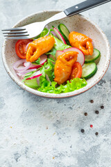 crab salad claws vegetable seafood surimi crab sticks tomato, cucumber, lettuce meal snack copy space food background rustic 