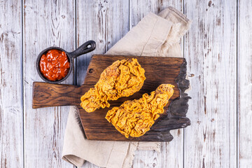 Fototapeta na wymiar Hot and crispy fried chicken legs. Kentucky fried chicken.