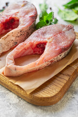 healthy food white fish raw steak silver carp ready to cook snack vegetarian meal top view copy space background rustic 
