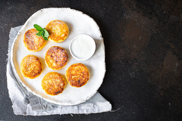 healthy food cheesecake sweet curd breakfast syrniki dessert cottage cheese pancakes healthy meal top view copy space rustic food background image