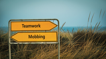 Street Sign to Teamwork versus Mobbing