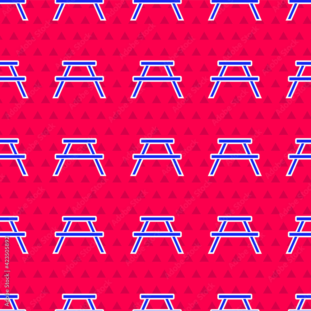 Poster blue picnic table with benches on either side of the table icon isolated seamless pattern on red bac