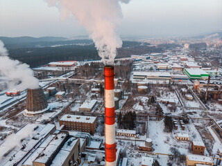 Coal processing plant. smoke of pipes pollutes atmosphere of the city. Concept of oil and gas processing, pollution of environment, emissions into water resources, oncological diseases, cancer