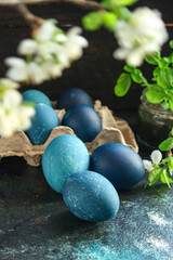 easter eggs season trend painted blue colour, easter treat festive table rustic meal top view copy space food background 