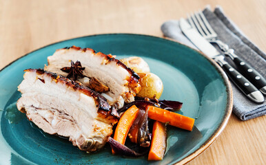 roasted pork with potato and carrot