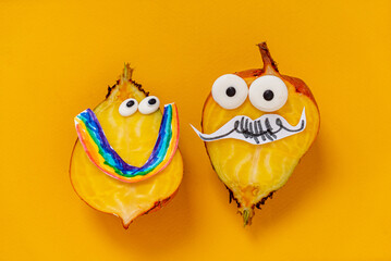 funny beets couple on the orange background