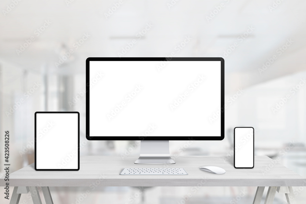 Poster Responsive display devices mockup for web page presentation on office desk. Tablet, computer display and smart phone on office desk