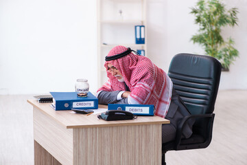 Male arab bookkeeper in retirement concept