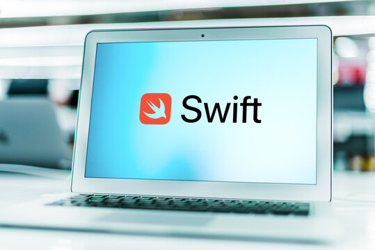 Laptop computer displaying logo of Swift