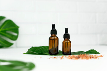 Wellness and spa concept. Body care. Natural oil. Unbranded bottle.Serum and cream