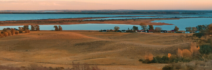 Obraz premium Landscape and Baltic Sea on the island Hiddensee at sunset in Au