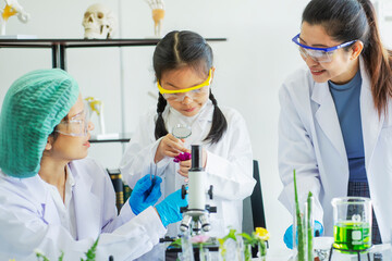Asian student study science in laboratory at school