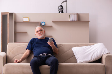 Devil visting old dying man at home