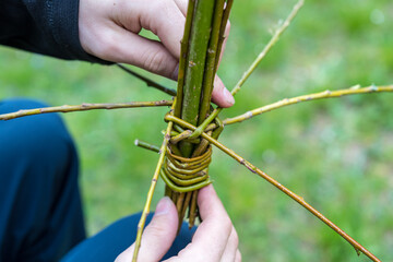 Making of traditional braided whip from pussywillow twigs for Easter Monday. Whip is known as "pomlazka", "tatar" or "karabáč" in Czech republic.