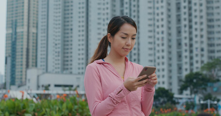 Woman use of smart phone at outdoor