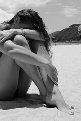 Beautiful Girl in a swimsuit on the beach. Tropical Landscape	