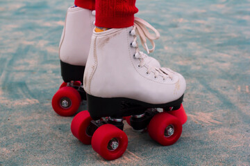 Red wheels roller skate