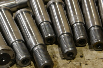 Tightening bolts ground with thread on the rack.