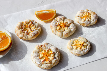 Cheesecake with cottage cheese sprinkled with orange shavings.
