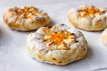 Cheesecake with cottage cheese sprinkled with orange shavings.