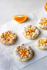 Cheesecake with cottage cheese sprinkled with orange shavings.