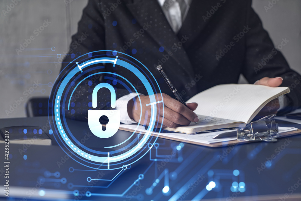 Aufkleber businesswoman is taking notes of clients needs to protect cyber security from hacker attacks and sav