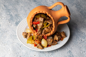 Authentic Turkish Testi Kebab cooked in earthenware waterjug, Turkish name; Testi kebabi