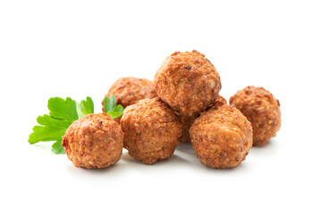 Fried meatballs with a parsley leaf isolated