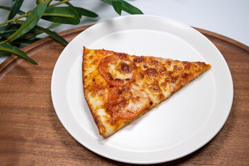Thinly sliced pepperoni is a popular pizza
