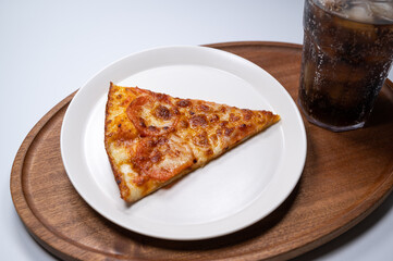 Thinly sliced pepperoni is a popular pizza