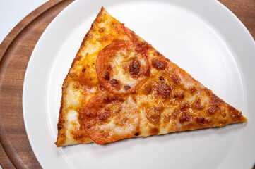 Thinly sliced pepperoni is a popular pizza