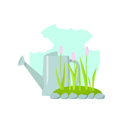 Watering can and flower bed with tulips