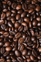 Macro photo of roasted coffee beans background
